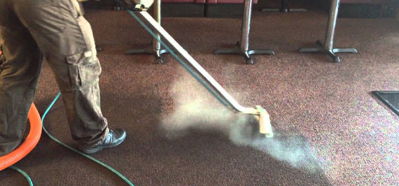 Steam carpet cleaning is being done in this restaurant space in Nevada.