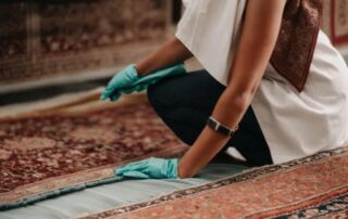 This image shows an oriental rug that is being cleaned.